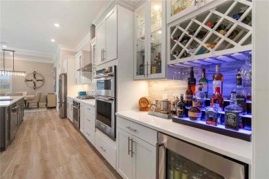 This exceptional Renown model was originally built for a fellow on The Concession Golf Club in Florida - for sale on GolfHomes.com, golf home, golf lot