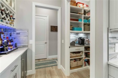 This exceptional Renown model was originally built for a fellow on The Concession Golf Club in Florida - for sale on GolfHomes.com, golf home, golf lot