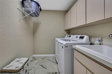 This beautiful and well maintained Alexander 3-bedroom on Glen Lakes Country Club in Florida - for sale on GolfHomes.com, golf home, golf lot