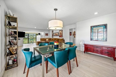 Enjoy beautiful golf course views from this bright and airy on  in Florida - for sale on GolfHomes.com, golf home, golf lot