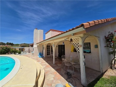 This home is located on the 15th fairway of the Cerbat Cliffs on Cerbat Cliffs Golf Course in Arizona - for sale on GolfHomes.com, golf home, golf lot