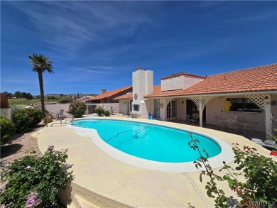This home is located on the 15th fairway of the Cerbat Cliffs on Cerbat Cliffs Golf Course in Arizona - for sale on GolfHomes.com, golf home, golf lot