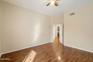 Wake up to sweeping views of the 18th tee from this impeccably on Coyote Lakes Golf Club in Arizona - for sale on GolfHomes.com, golf home, golf lot