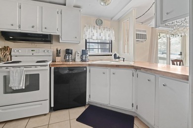 This charming 3-bedroom, 2-bath home is located in Crystal Lake on Prestwick Country Club in South Carolina - for sale on GolfHomes.com, golf home, golf lot