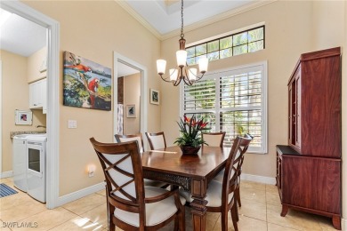 Paradise Found: Immaculate Waterfront Pool Home with TWO MASTER on Royal Tee Country Club in Florida - for sale on GolfHomes.com, golf home, golf lot