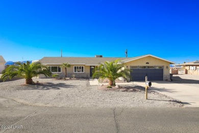 Don't miss the opportunity to own this charming and cozy home on London Bridge Golf Course in Arizona - for sale on GolfHomes.com, golf home, golf lot