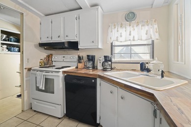 This charming 3-bedroom, 2-bath home is located in Crystal Lake on Prestwick Country Club in South Carolina - for sale on GolfHomes.com, golf home, golf lot