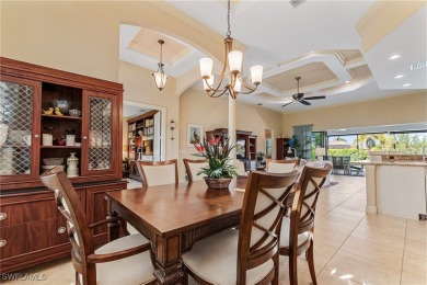 Paradise Found: Immaculate Waterfront Pool Home with TWO MASTER on Royal Tee Country Club in Florida - for sale on GolfHomes.com, golf home, golf lot