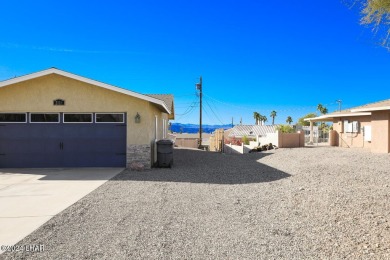 Don't miss the opportunity to own this charming and cozy home on London Bridge Golf Course in Arizona - for sale on GolfHomes.com, golf home, golf lot