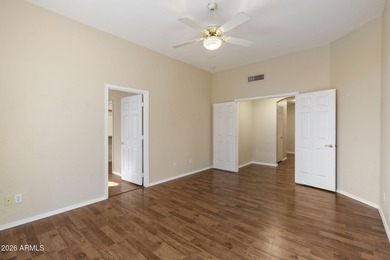 Wake up to sweeping views of the 18th tee from this impeccably on Coyote Lakes Golf Club in Arizona - for sale on GolfHomes.com, golf home, golf lot