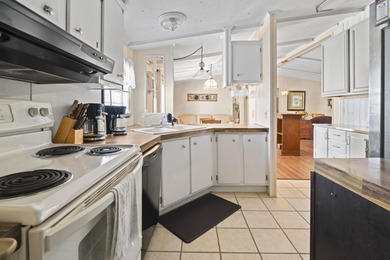 This charming 3-bedroom, 2-bath home is located in Crystal Lake on Prestwick Country Club in South Carolina - for sale on GolfHomes.com, golf home, golf lot