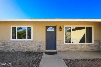 Don't miss the opportunity to own this charming and cozy home on London Bridge Golf Course in Arizona - for sale on GolfHomes.com, golf home, golf lot