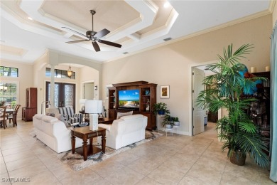 Paradise Found: Immaculate Waterfront Pool Home with TWO MASTER on Royal Tee Country Club in Florida - for sale on GolfHomes.com, golf home, golf lot