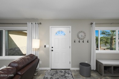Don't miss the opportunity to own this charming and cozy home on London Bridge Golf Course in Arizona - for sale on GolfHomes.com, golf home, golf lot
