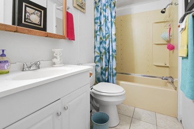 This charming 3-bedroom, 2-bath home is located in Crystal Lake on Prestwick Country Club in South Carolina - for sale on GolfHomes.com, golf home, golf lot