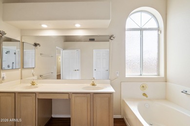 Wake up to sweeping views of the 18th tee from this impeccably on Coyote Lakes Golf Club in Arizona - for sale on GolfHomes.com, golf home, golf lot