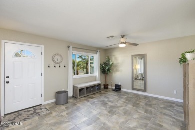 Don't miss the opportunity to own this charming and cozy home on London Bridge Golf Course in Arizona - for sale on GolfHomes.com, golf home, golf lot
