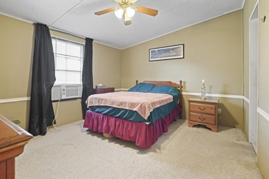 This charming 3-bedroom, 2-bath home is located in Crystal Lake on Prestwick Country Club in South Carolina - for sale on GolfHomes.com, golf home, golf lot