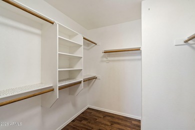 Wake up to sweeping views of the 18th tee from this impeccably on Coyote Lakes Golf Club in Arizona - for sale on GolfHomes.com, golf home, golf lot