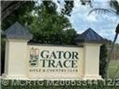 Luxury 2BR/2BA first-floor condo in the desirable mostly adult on Gator Trace Golf and Country Club in Florida - for sale on GolfHomes.com, golf home, golf lot