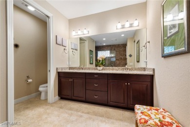 Paradise Found: Immaculate Waterfront Pool Home with TWO MASTER on Royal Tee Country Club in Florida - for sale on GolfHomes.com, golf home, golf lot