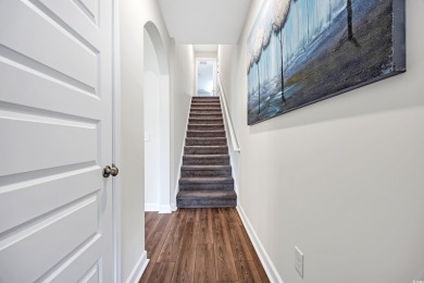 Step Into Coastal Luxury: Two Primary Suites, Two Fireplaces on International Club of Myrtle Beach in South Carolina - for sale on GolfHomes.com, golf home, golf lot