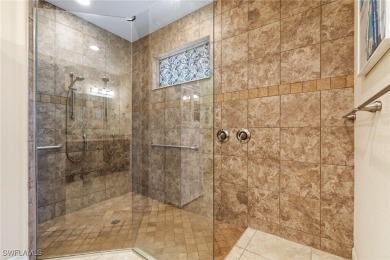 Paradise Found: Immaculate Waterfront Pool Home with TWO MASTER on Royal Tee Country Club in Florida - for sale on GolfHomes.com, golf home, golf lot