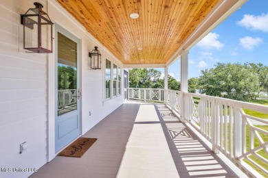 Beautiful home with gorgeous views of the Bay of Saint Louis! on The Bridges Golf Club At Hollywood Casino in Mississippi - for sale on GolfHomes.com, golf home, golf lot
