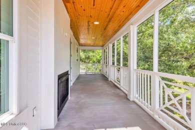 Beautiful home with gorgeous views of the Bay of Saint Louis! on The Bridges Golf Club At Hollywood Casino in Mississippi - for sale on GolfHomes.com, golf home, golf lot