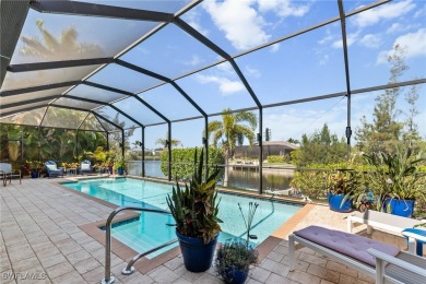 Paradise Found: Immaculate Waterfront Pool Home with TWO MASTER on Royal Tee Country Club in Florida - for sale on GolfHomes.com, golf home, golf lot