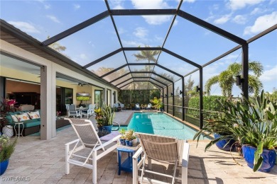 Paradise Found: Immaculate Waterfront Pool Home with TWO MASTER on Royal Tee Country Club in Florida - for sale on GolfHomes.com, golf home, golf lot