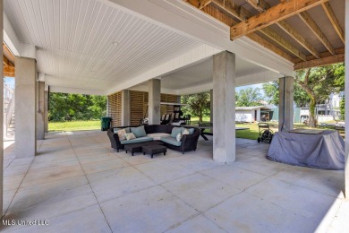 Beautiful home with gorgeous views of the Bay of Saint Louis! on The Bridges Golf Club At Hollywood Casino in Mississippi - for sale on GolfHomes.com, golf home, golf lot