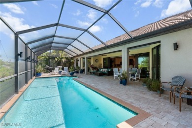 Paradise Found: Immaculate Waterfront Pool Home with TWO MASTER on Royal Tee Country Club in Florida - for sale on GolfHomes.com, golf home, golf lot