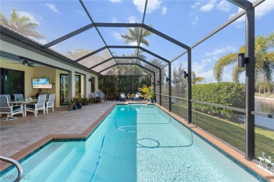 Paradise Found: Immaculate Waterfront Pool Home with TWO MASTER on Royal Tee Country Club in Florida - for sale on GolfHomes.com, golf home, golf lot