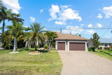 Paradise Found: Immaculate Waterfront Pool Home with TWO MASTER on Royal Tee Country Club in Florida - for sale on GolfHomes.com, golf home, golf lot
