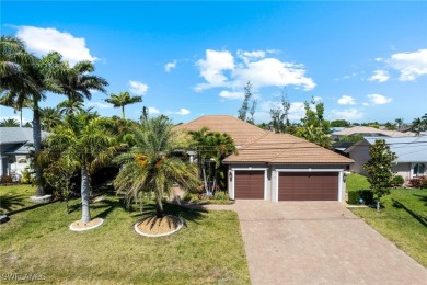 Paradise Found: Immaculate Waterfront Pool Home with TWO MASTER on Royal Tee Country Club in Florida - for sale on GolfHomes.com, golf home, golf lot