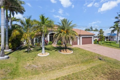 Paradise Found: Immaculate Waterfront Pool Home with TWO MASTER on Royal Tee Country Club in Florida - for sale on GolfHomes.com, golf home, golf lot