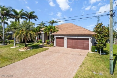 Paradise Found: Immaculate Waterfront Pool Home with TWO MASTER on Royal Tee Country Club in Florida - for sale on GolfHomes.com, golf home, golf lot