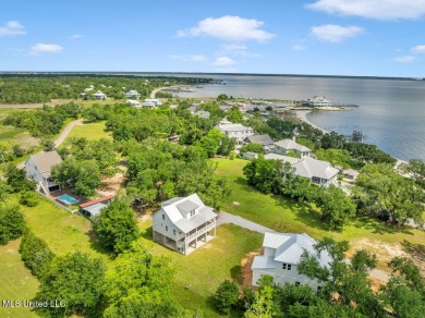 Beautiful home with gorgeous views of the Bay of Saint Louis! on The Bridges Golf Club At Hollywood Casino in Mississippi - for sale on GolfHomes.com, golf home, golf lot