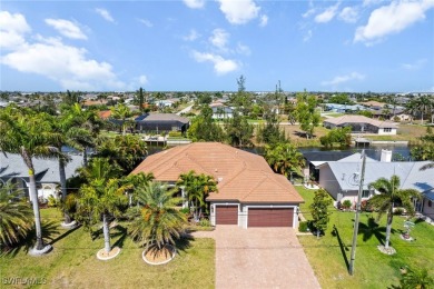 Paradise Found: Immaculate Waterfront Pool Home with TWO MASTER on Royal Tee Country Club in Florida - for sale on GolfHomes.com, golf home, golf lot