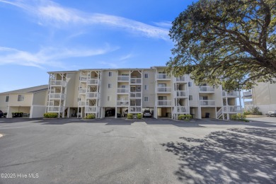 This top-floor residence has been lovingly maintained and on Brick Landing Plantation Yacht and Golf Club in North Carolina - for sale on GolfHomes.com, golf home, golf lot