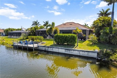 Paradise Found: Immaculate Waterfront Pool Home with TWO MASTER on Royal Tee Country Club in Florida - for sale on GolfHomes.com, golf home, golf lot