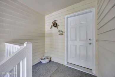 This top-floor residence has been lovingly maintained and on Brick Landing Plantation Yacht and Golf Club in North Carolina - for sale on GolfHomes.com, golf home, golf lot