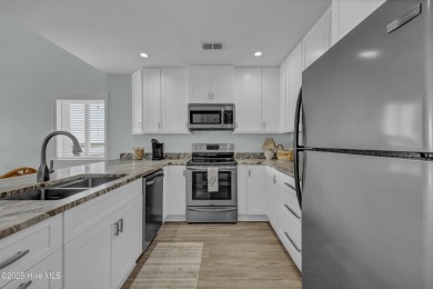 This top-floor residence has been lovingly maintained and on Brick Landing Plantation Yacht and Golf Club in North Carolina - for sale on GolfHomes.com, golf home, golf lot