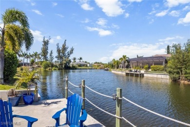 Paradise Found: Immaculate Waterfront Pool Home with TWO MASTER on Royal Tee Country Club in Florida - for sale on GolfHomes.com, golf home, golf lot
