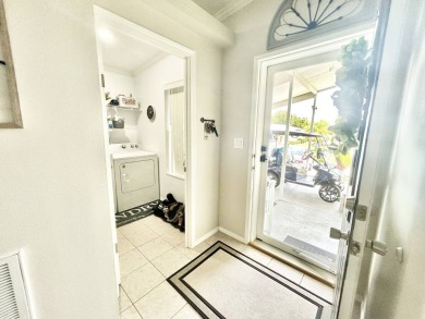 Welcome to this beautifully maintained 3-bedroom, 2-bathroom on Crane Lakes Golf and Country Club in Florida - for sale on GolfHomes.com, golf home, golf lot
