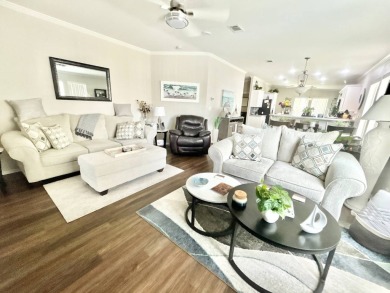 Welcome to this beautifully maintained 3-bedroom, 2-bathroom on Crane Lakes Golf and Country Club in Florida - for sale on GolfHomes.com, golf home, golf lot
