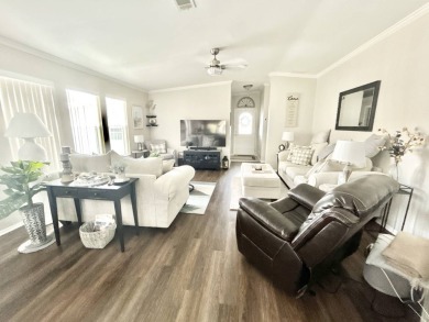 Welcome to this beautifully maintained 3-bedroom, 2-bathroom on Crane Lakes Golf and Country Club in Florida - for sale on GolfHomes.com, golf home, golf lot