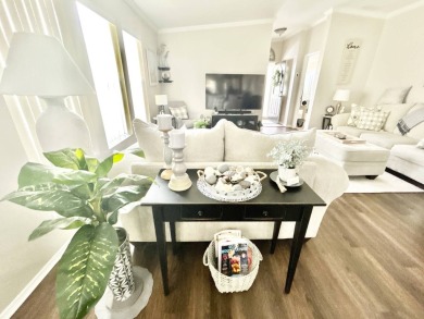 Welcome to this beautifully maintained 3-bedroom, 2-bathroom on Crane Lakes Golf and Country Club in Florida - for sale on GolfHomes.com, golf home, golf lot
