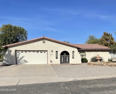 This 3 Bedroom + Den, 2 Bathroom Pool home, is perfectly located on London Bridge Golf Course in Arizona - for sale on GolfHomes.com, golf home, golf lot